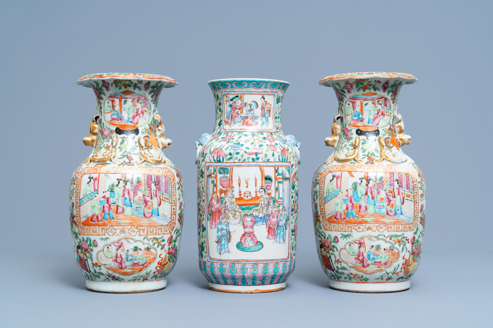 A pair of Chinese Canton famille rose vases and a single vase, 19th C.