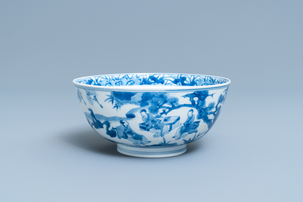 A Chinese blue and white 'scholars and attendants' bowl, Kangxi mark and of the period