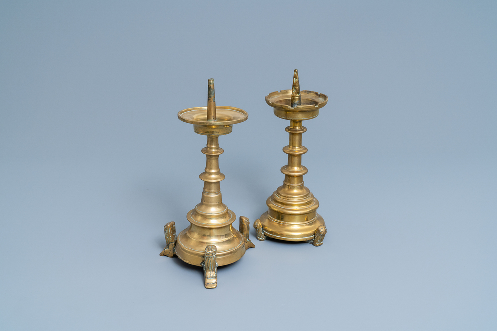Two Flemish or Dutch bronze candlesticks, 15/16th C.