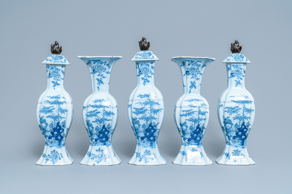 A Dutch Delft blue and white five-piece garniture with floral chinoiserie design, 18th C.
