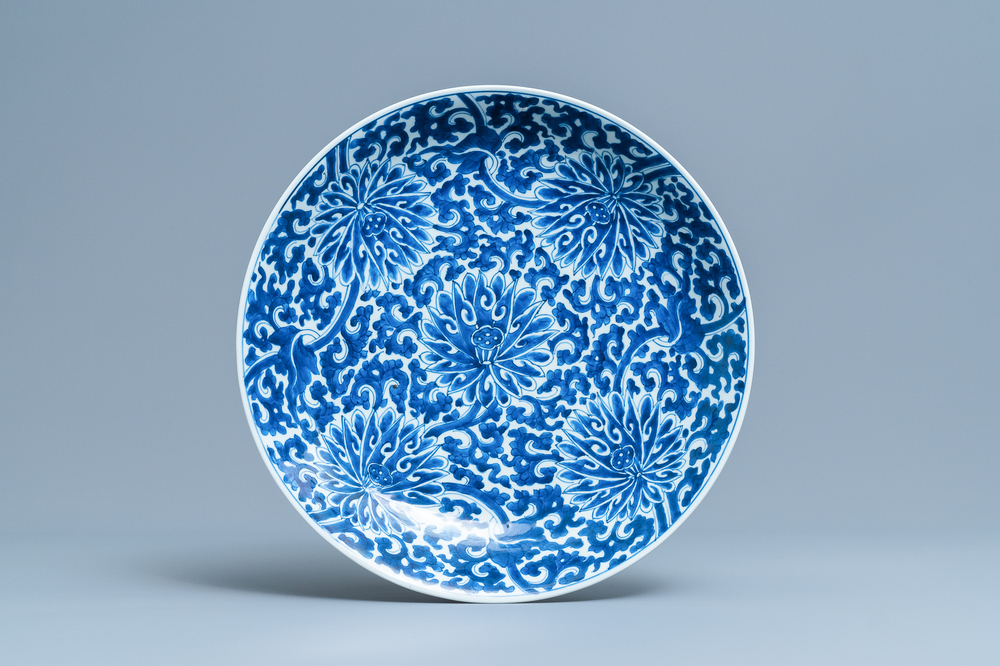 A Chinese blue and white 'lotus scroll' charger, Kangxi