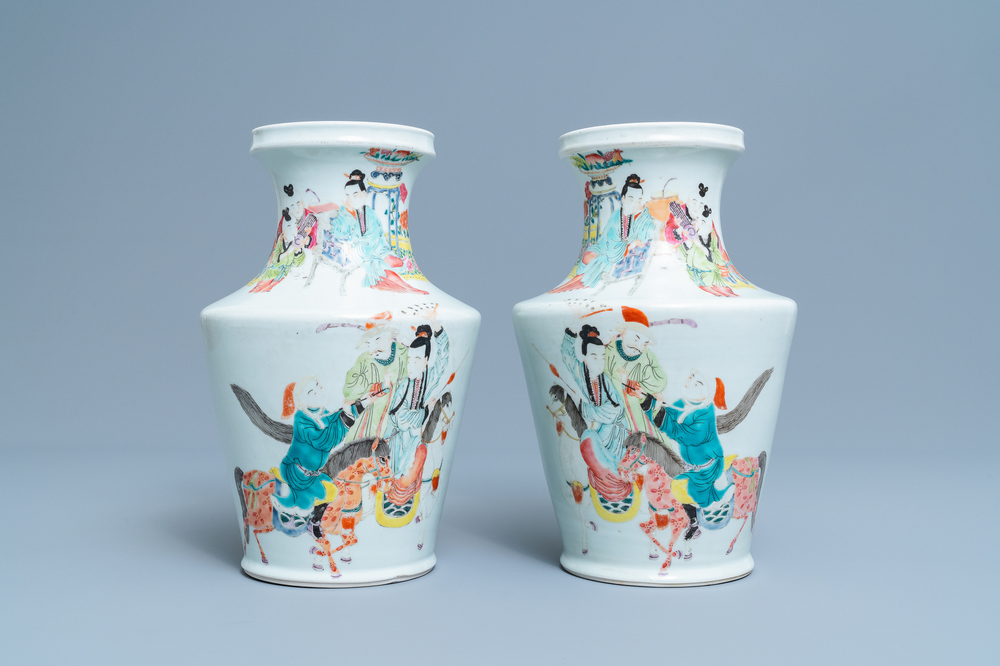 A pair of Chinese famille rose Yongzheng-style vases, 19/20th C.