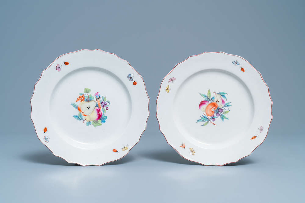 Two polychrome Tournai porcelain plates with fruits, 18th C.