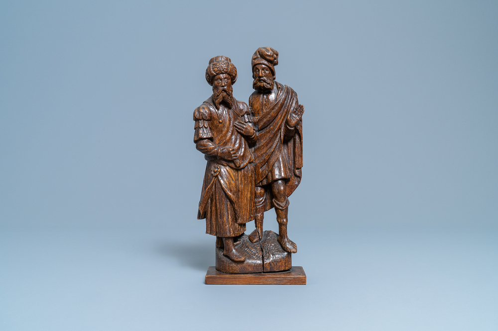 A Flemish carved oak group depicting two jews, probably Antwerp, 16th C.