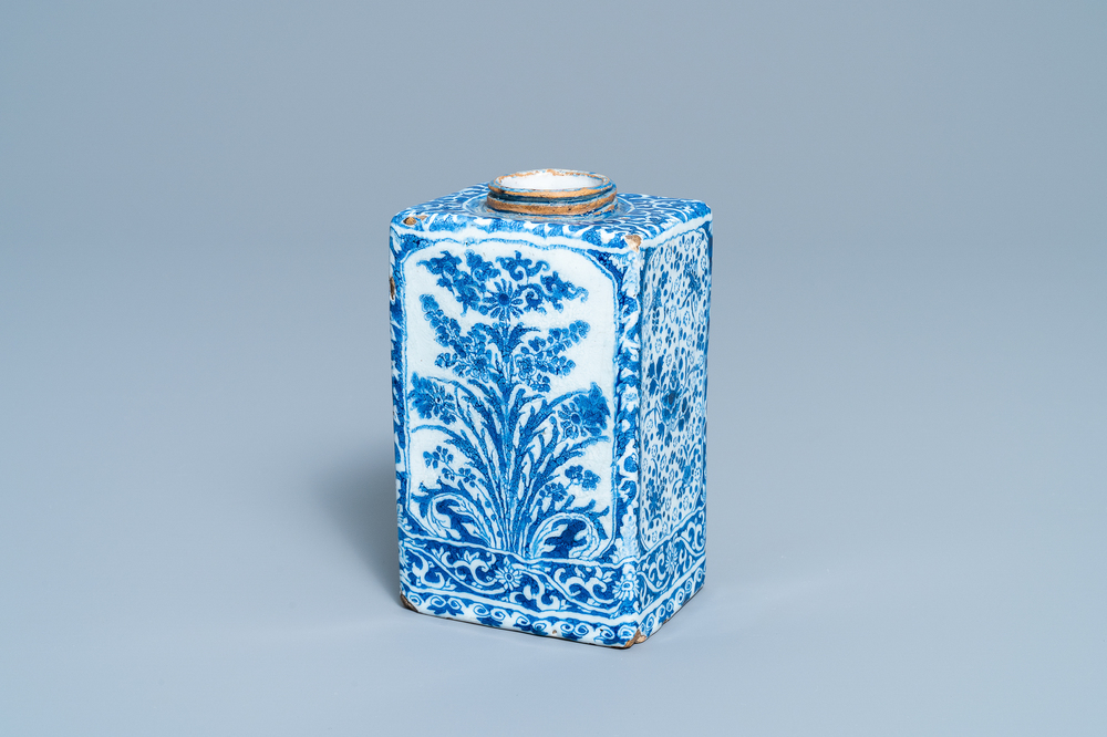 A rectangular Dutch Delft blue and white tea caddy with floral design, late 17th C.