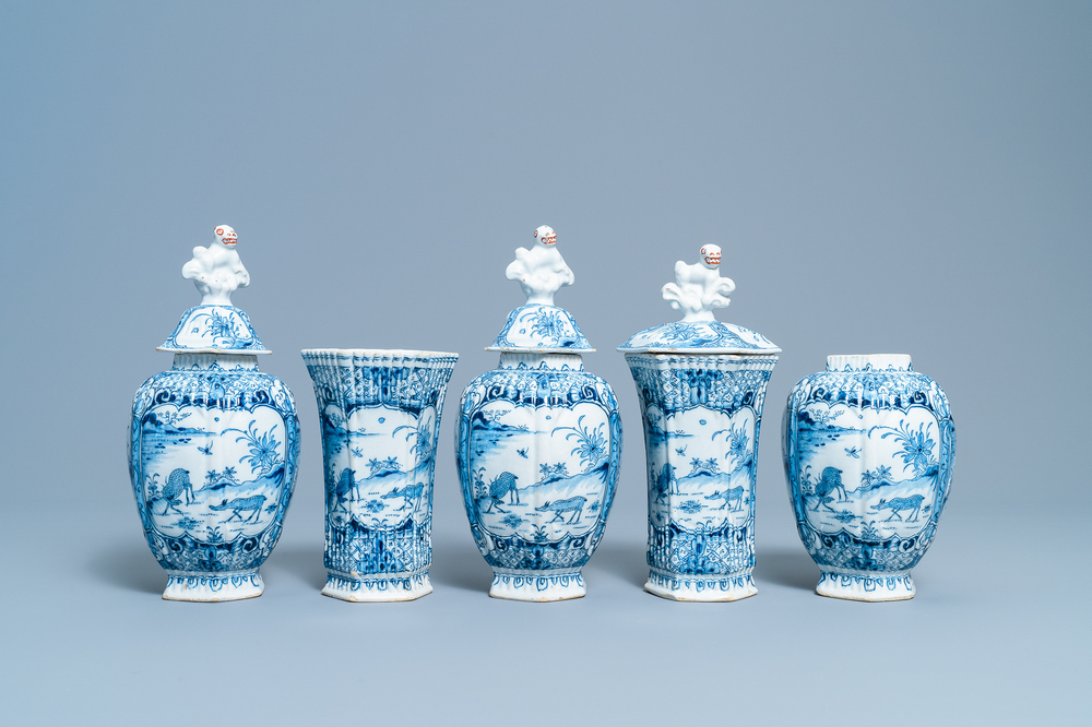 A Dutch Delft blue and white five-piece garniture with chinoiserie design with deer, 18th C.