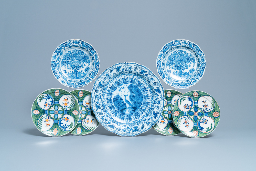 Six Dutch Delft polychrome and blue and white plates and a dish, 18th C.