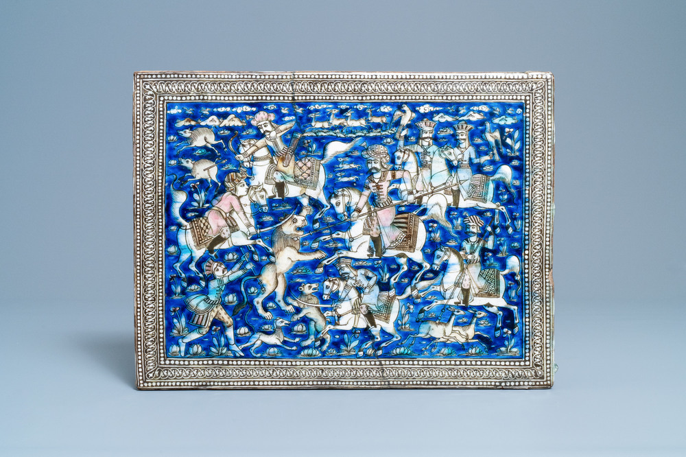 A large rectangular polychrome 'hunting scene' tile, Qajar, Iran, 19th C.