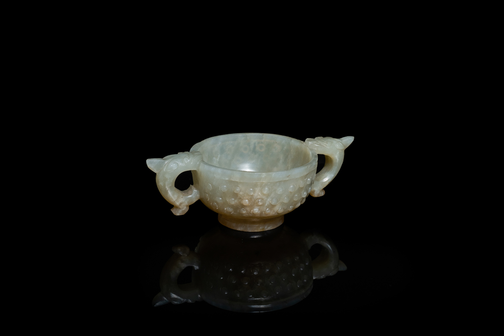 A Chinese celadon jade two-handled libation cup, Ming