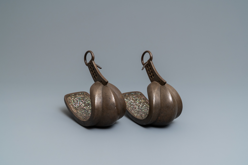 A pair of Japanese 'abumi' stirrups with 'raden' inlay of mother-of-pearl, Edo, 18th C.