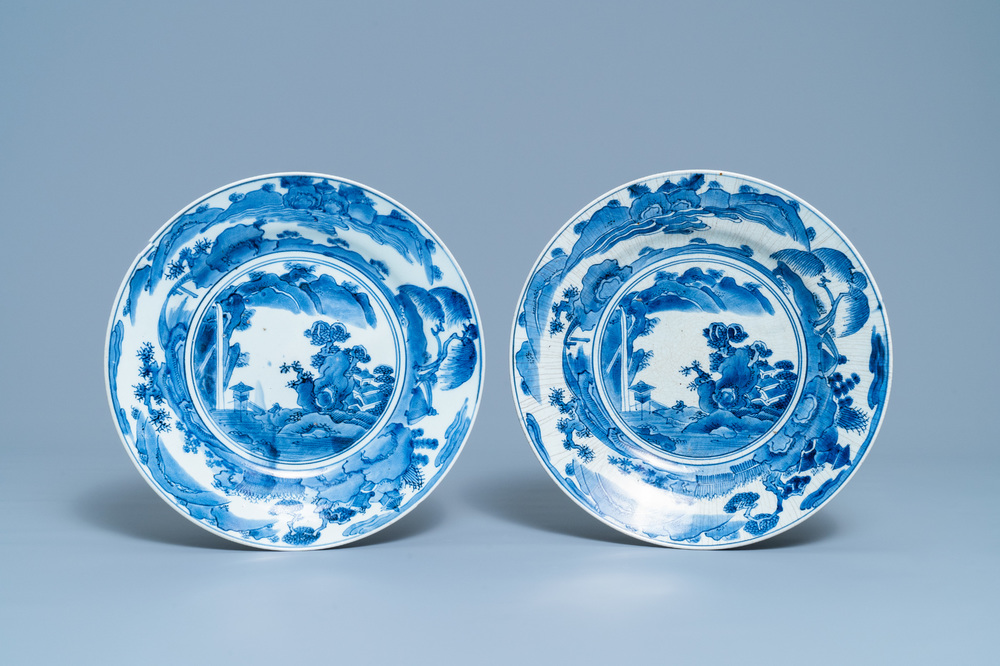 A pair of Japanese blue and white Arita dishes with mountainous landscapes, Edo, 17/18th C.