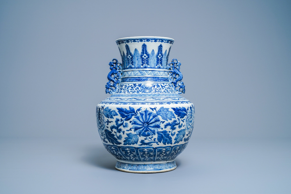 A Chinese blue and white 'hu' vase with floral design, Qianlong mark, 19th C.