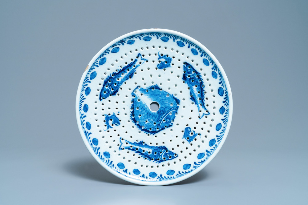 A Dutch Delft blue and white fish strainer, 18th C.