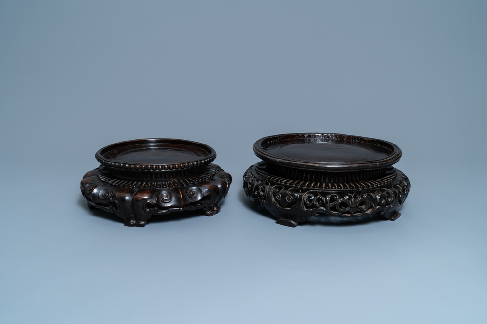 Two large Chinese reticulated wooden stands, 18/19th C.