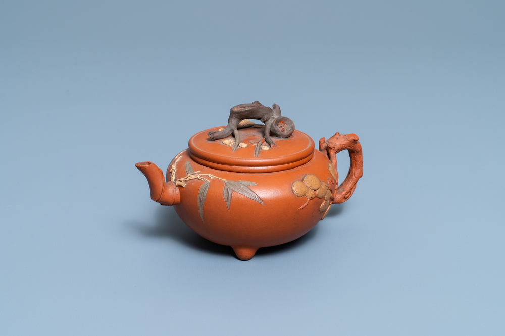 A Chinese Yixing stoneware 'Three friends of winter' teapot and cover, Kangxi