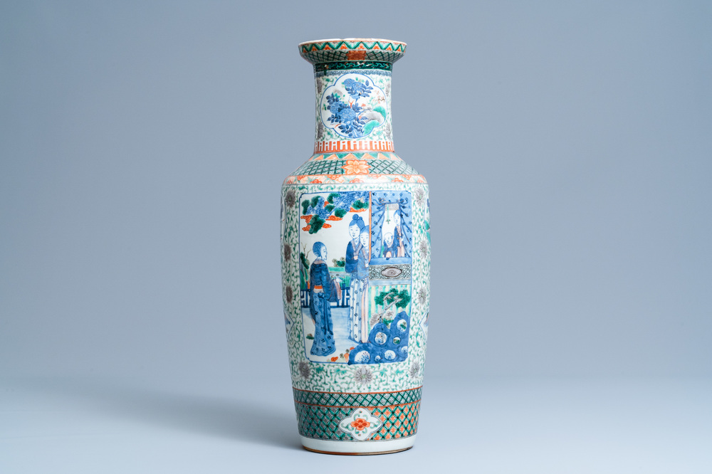 A Chinese famille verte rouleau vase with ladies in a garden, 19th C.