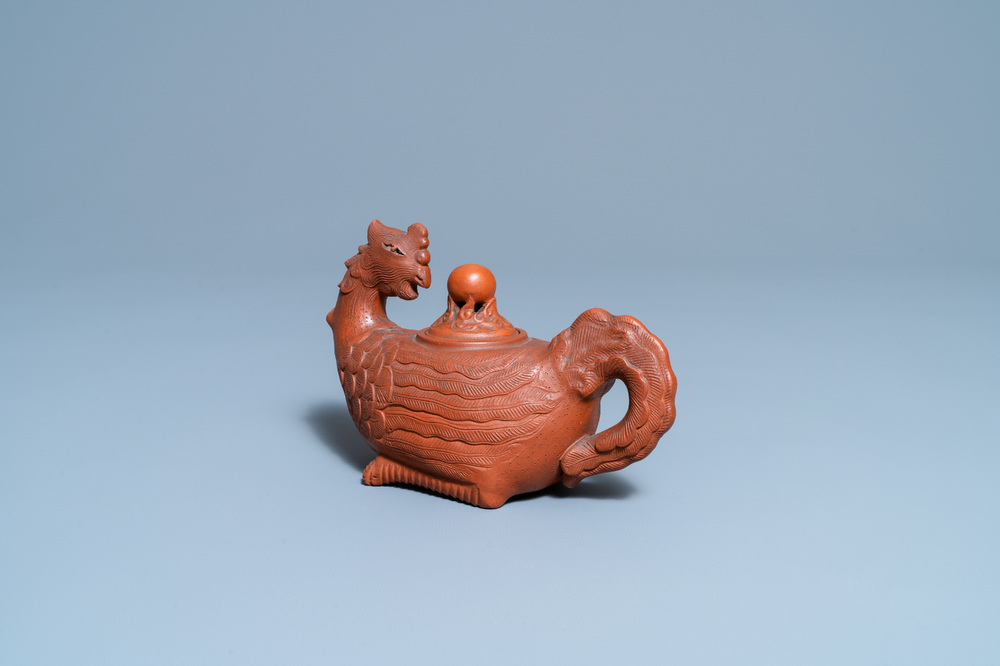 A Chinese Yixing 'phoenix' stoneware teapot and cover, Kangxi