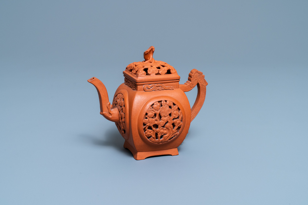 A Chinese reticulated Yixing stoneware teapot and cover, Kangxi