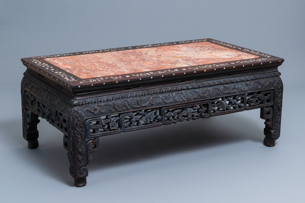 A Chinese mother-of-pearl-inlaid wooden low side table with marble top, 19th C.