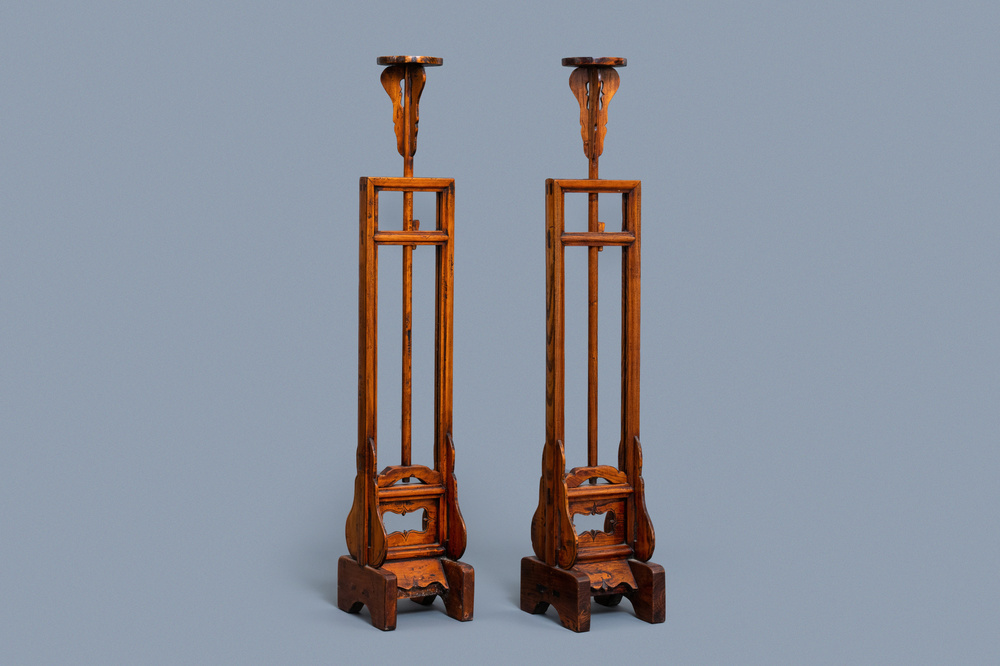 A pair of Chinese wooden lamp stands, 19th C.