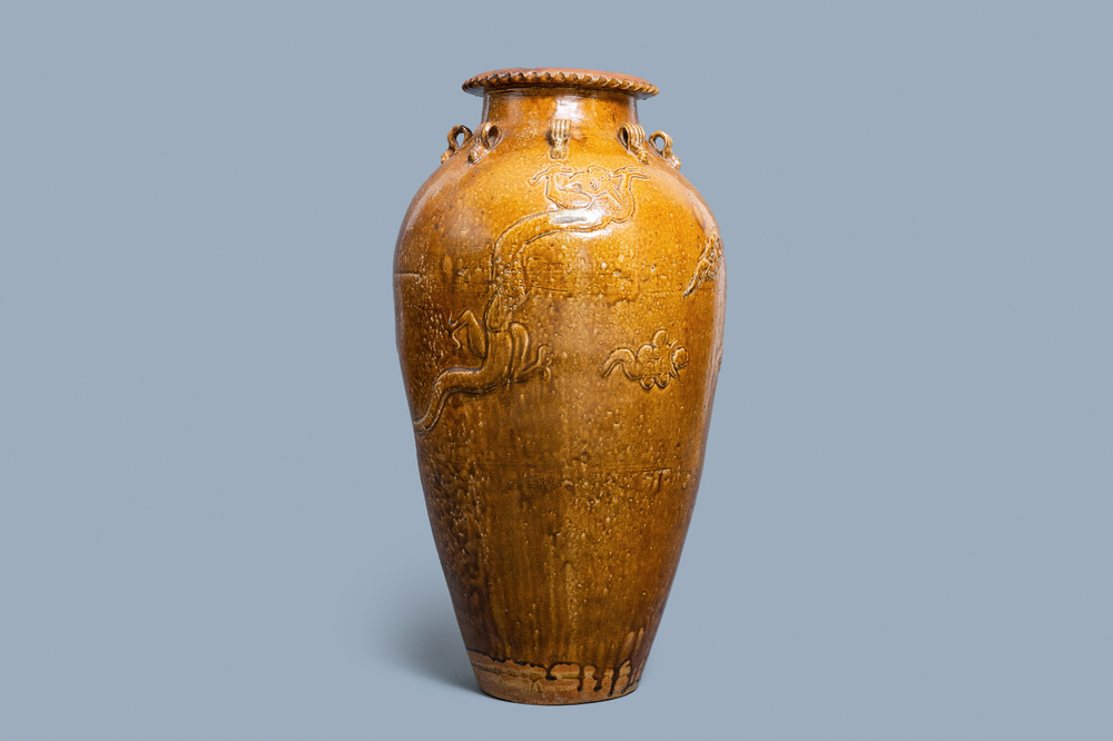 A large Chinese brown-glazed relief-molded martaban jar with dragons, Qing