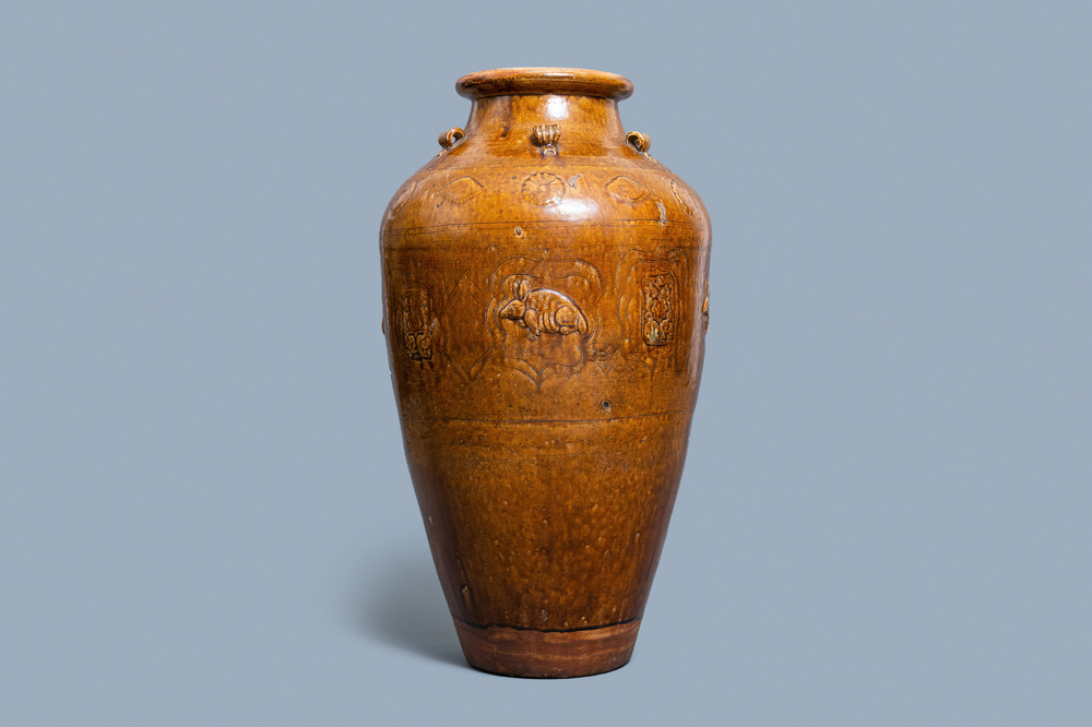 A large Chinese brown-glazed relief-molded and incised martaban jar, Qing