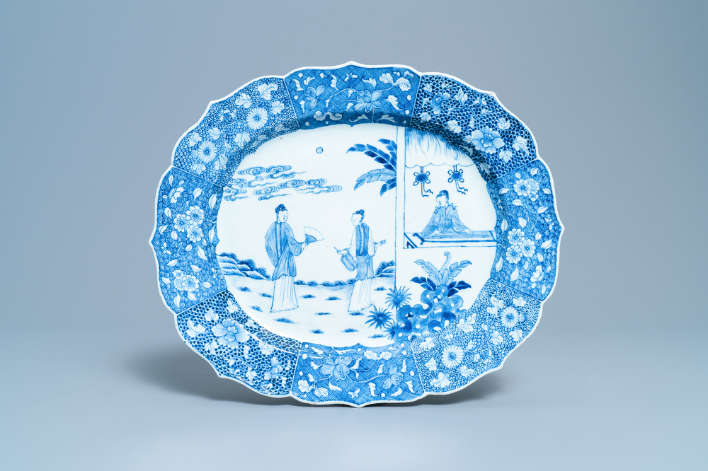 A large oval Chinese blue and white 'Romance of the Western Chamber' dish, Qianlong