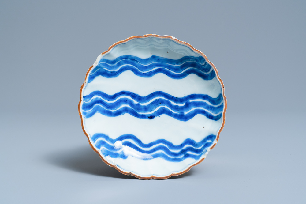 A Chinese blue and white ko-sometsuke 'wave' plate for the Japanese market, Chenghua mark, Tianqi