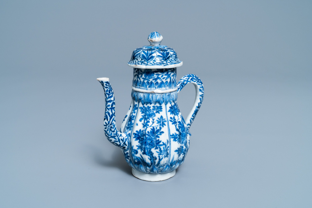 A tall Chinese blue and white teapot and cover, Kangxi