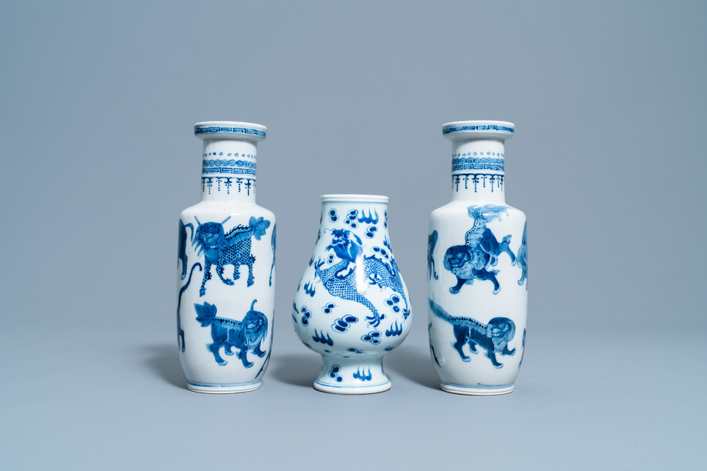 A pair of Chinese blue and white 'mythical beasts' vases and a pear-shaped 'dragon and phoenix' vase, 19th C.