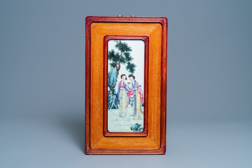 A Chinese famille rose plaque with two ladies in a garden, Republic