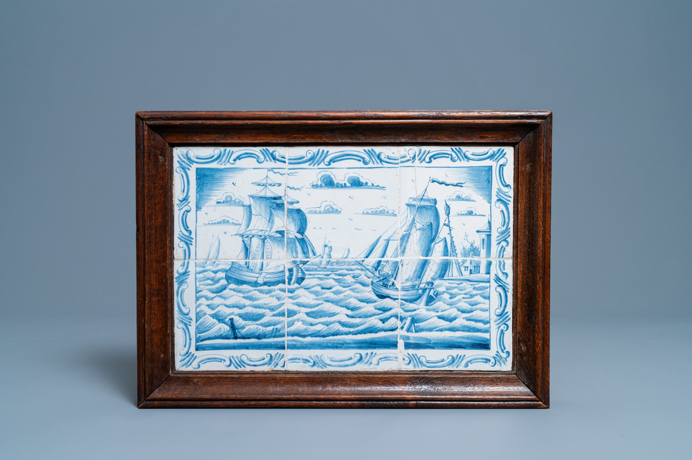 A Dutch Delft blue and white tile mural with ships at sea, 18th C.