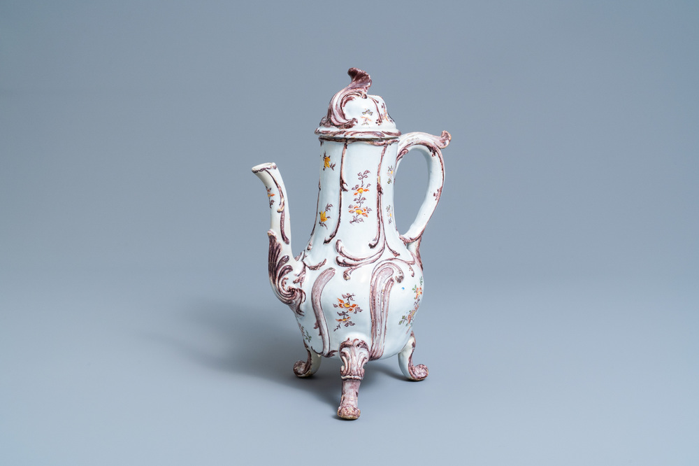 A tall polychrome Dutch Delft coffee pot and cover, 18th C.