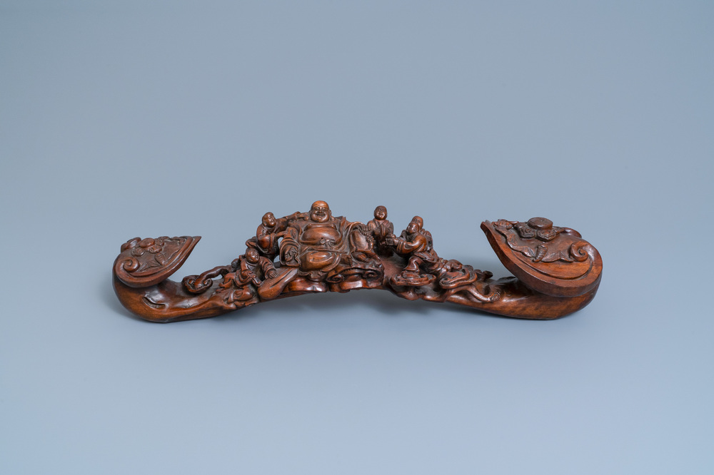 A large Chinese carved wooden ruyi scepter, 19th C.