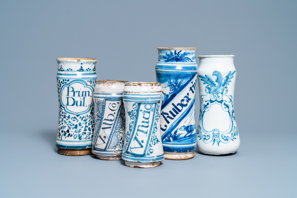 A collection of five Spanish blue and white albarello-type drug jars, 17th C.