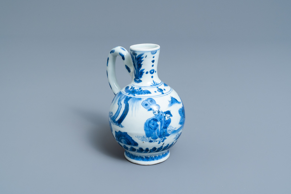 A Chinese blue and white ewer with figures in a landscape, Transitional period