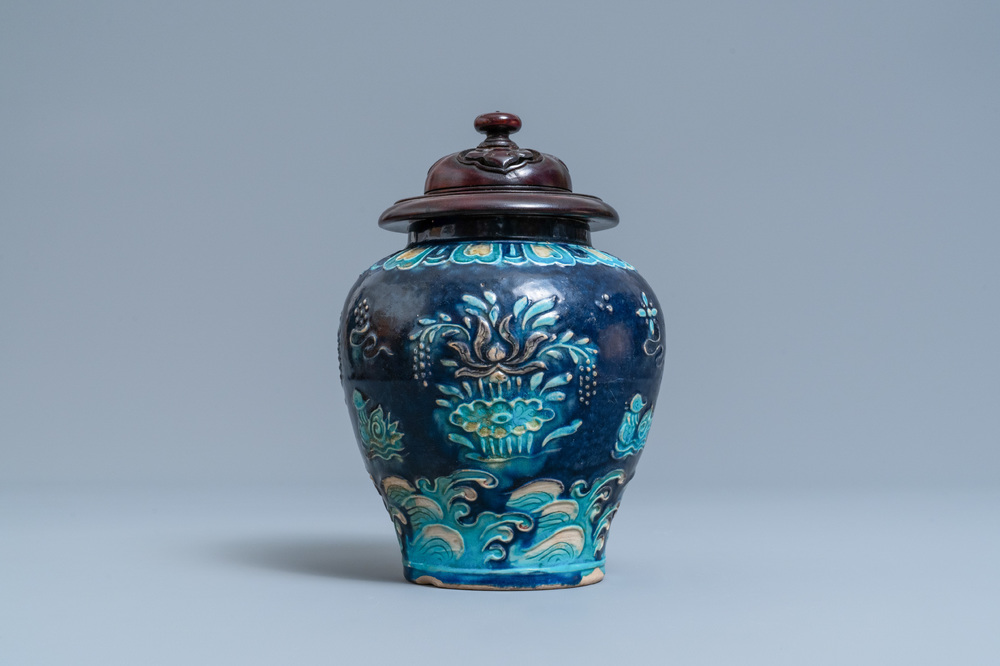 A Chinese fahua vase with mandarin ducks in a lotus pond, Ming