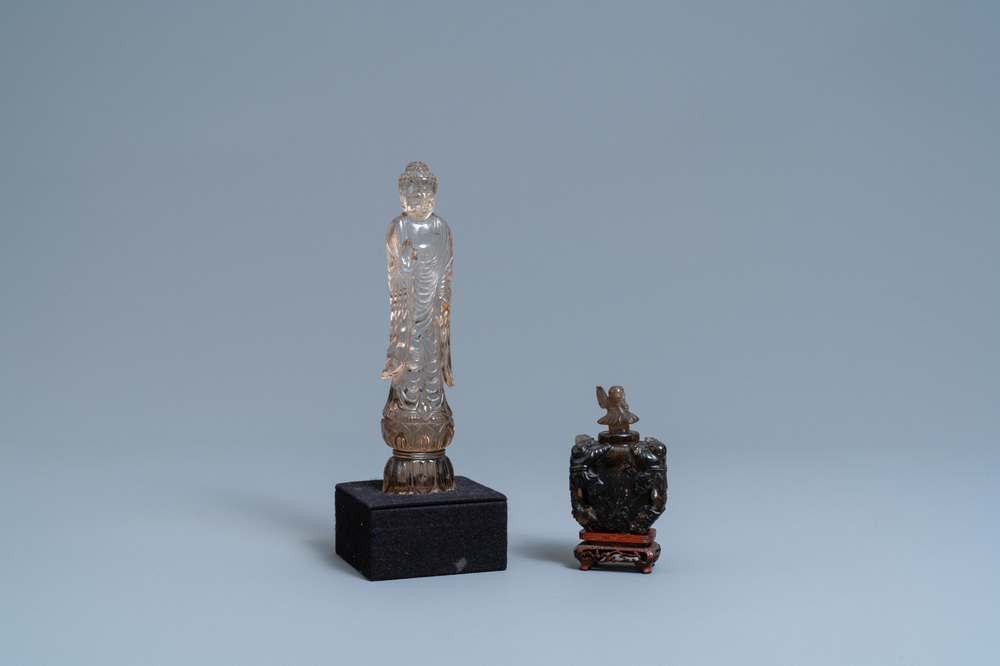 A Chinese carved rock crystal figure of Buddha and a small vase and cover, 19/20th C.