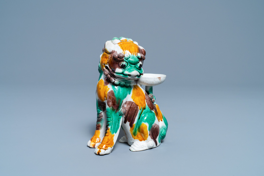 A Chinese sancai-glazed biscuit Buddhist lion joss stick holder, Kangxi