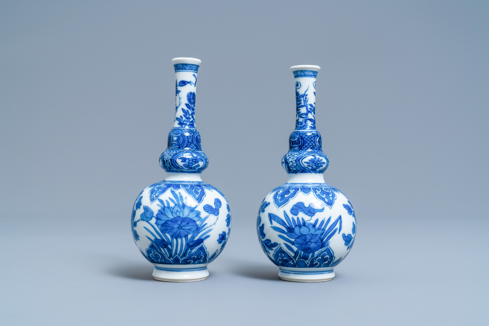 A pair of Chinese blue and white double gourd vases, Kangxi