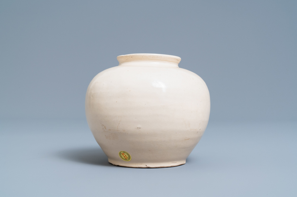 A Chinese monochrome white-glazed jar, Tang