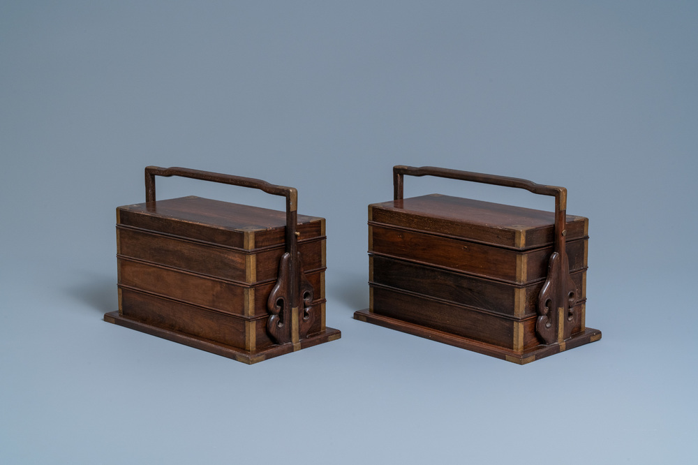 A pair of rectangular Chinese three-tiered hongmu wooden covered boxes, 19th C.