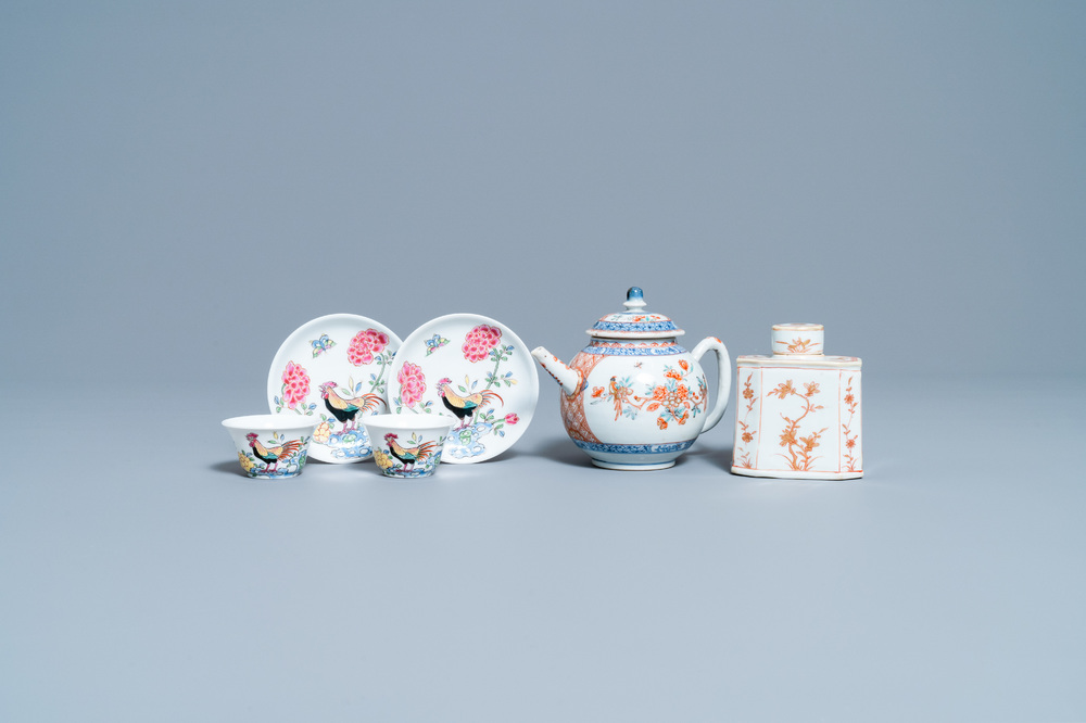 A pair of Chinese famille rose cups and saucers, a Dutch-decorated teapot and a tea caddy, Kangxi/Qianlong