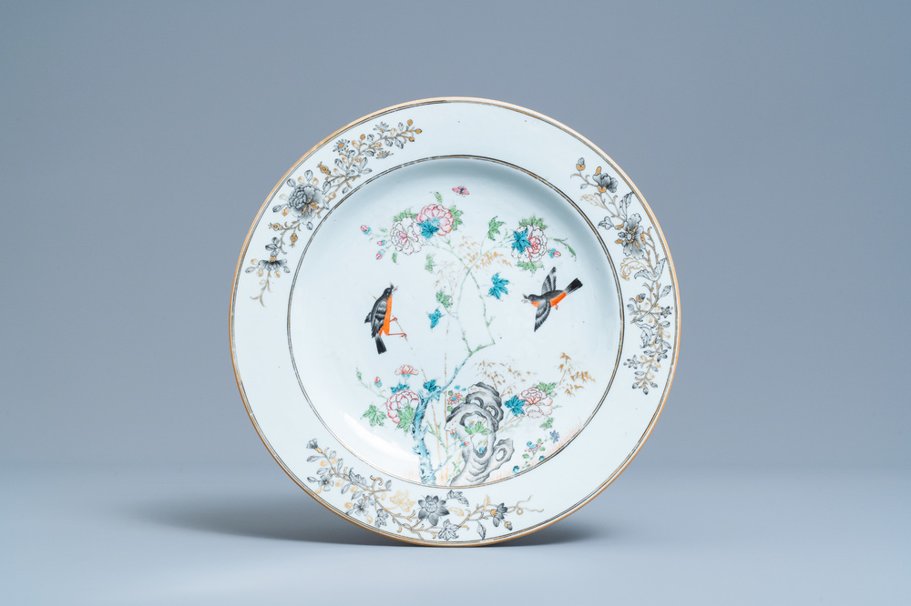 A Chinese famille rose, grisaille and gilt dish with birds among branches, Yongzheng/Qianlong
