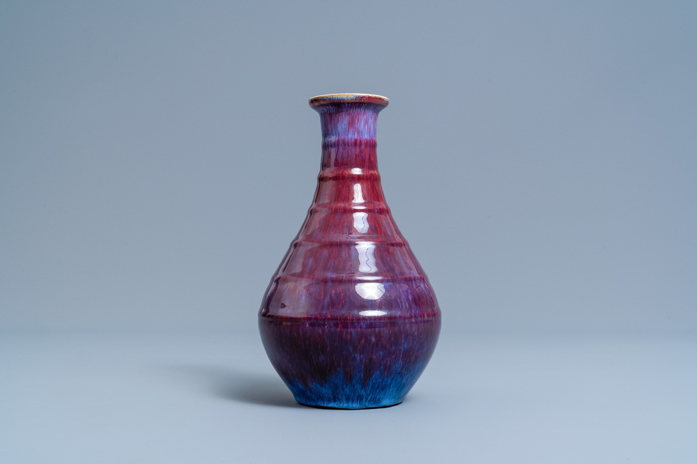 A Chinese flamb&eacute;-glazed bottle vase, Yongzheng mark, 19th C.