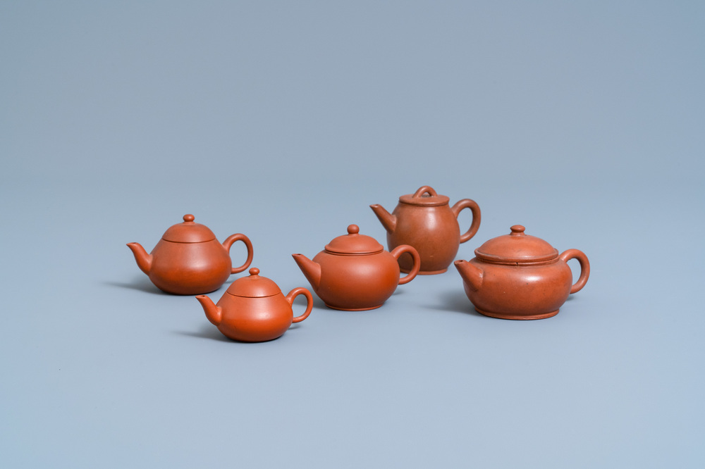 Five Chinese Yixing stoneware teapots and covers, 19th C.