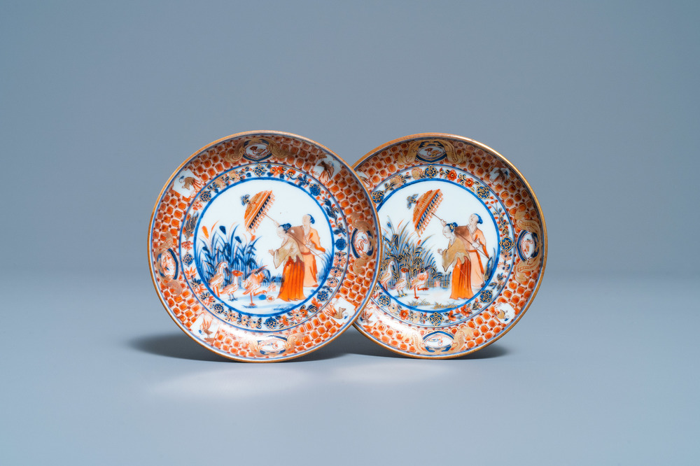 A pair of small Chinese Imari-style saucer dishes after Cornelis Pronk: 'Dames au parasol', Qianlong