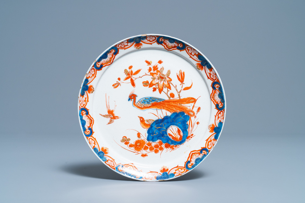 A Dutch Delft dor&eacute; 'peacock' plate, 18th C.