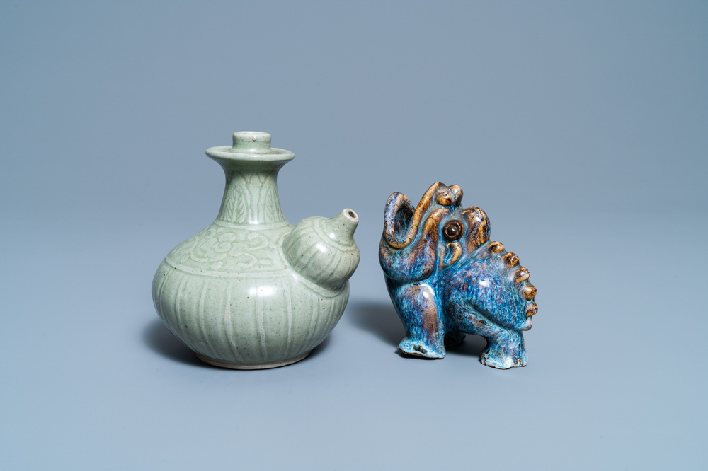 A Chinese celadon-glazed kendi and a Shiwan flamb&eacute;-glazed beast-shaped censer, 18/19th C.