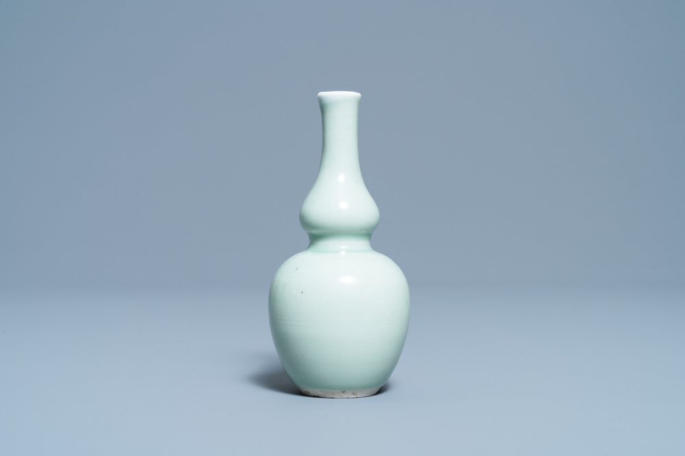 A Chinese monochrome celadon double gourd vase, Kangxi